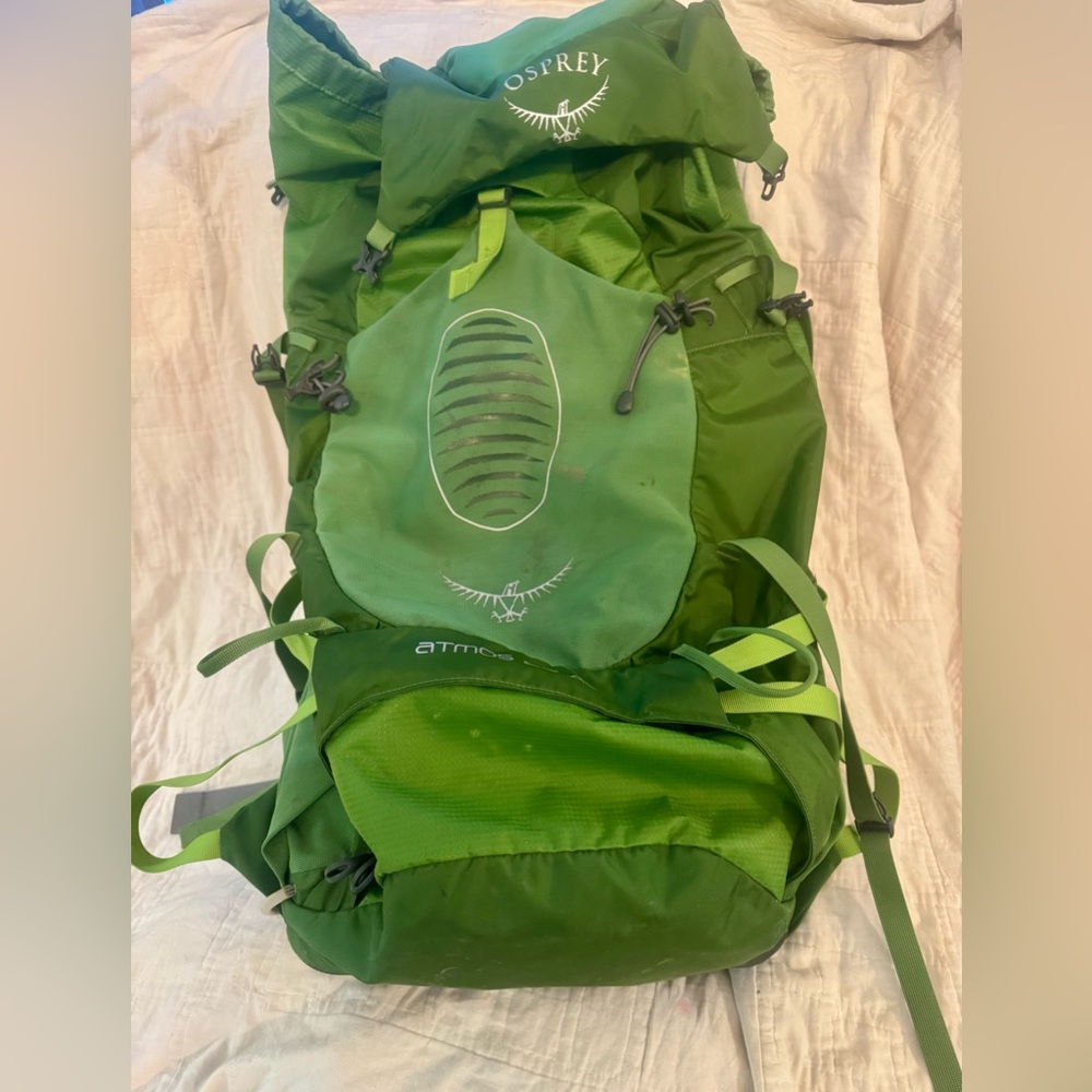 Osprey Atmos AG 50. Gently used. Small stains, no rips or tears.